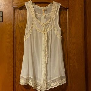 Sleeveless sheer lace button up victorian style blouse